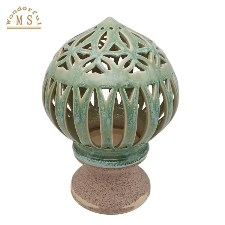 Chinese elements of stoneware Baolian lamp style design tea light candle holder carved with reactive green color glazing surface
