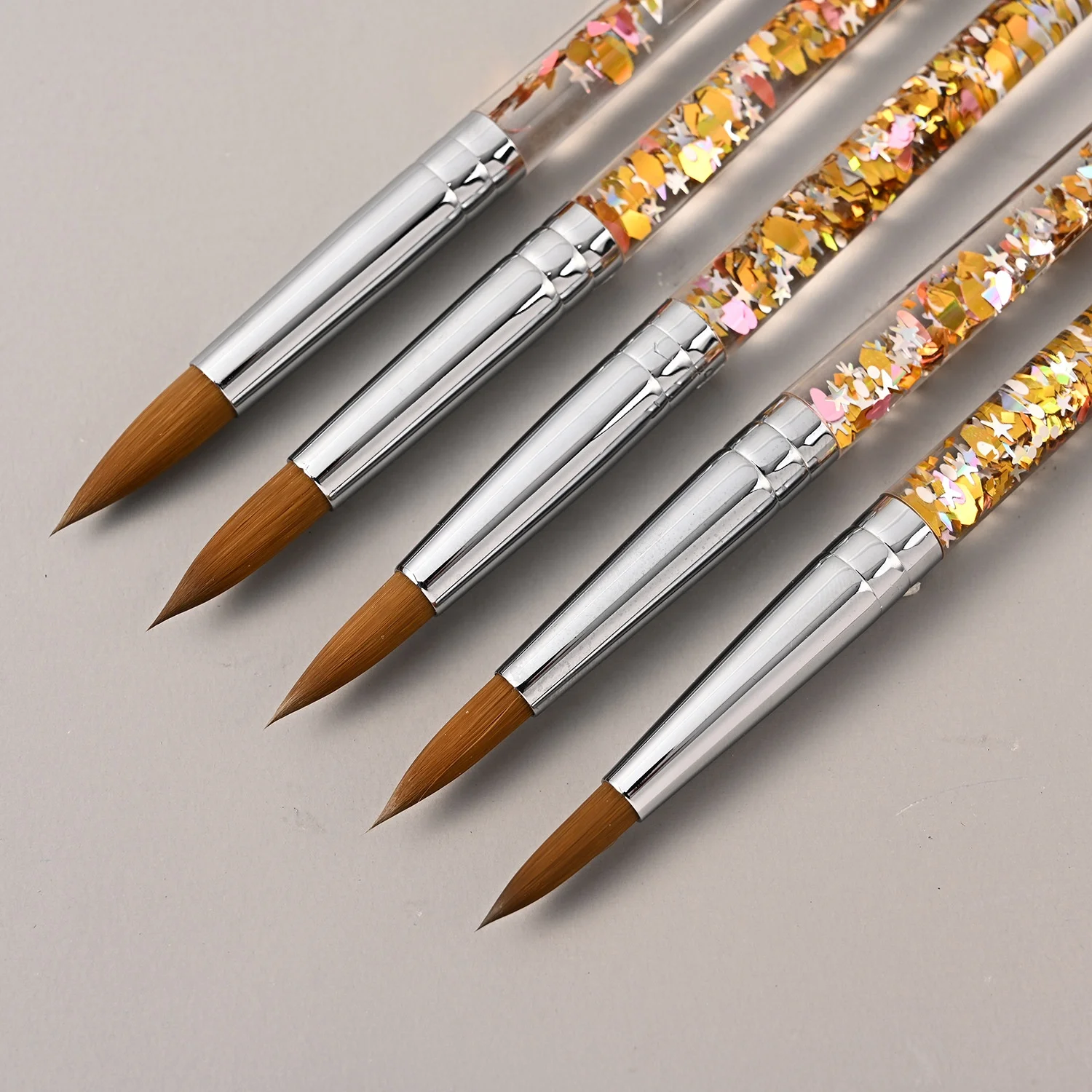 90 Kolinsky Oval Crimped Shaped Brush With Pink Liquid Glitter Hand