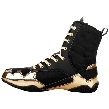 gold and black boxing boots