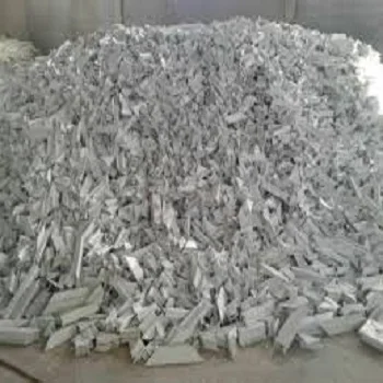 washed rigid PVC regrind scraps from recycled white PVC pipes and fittings