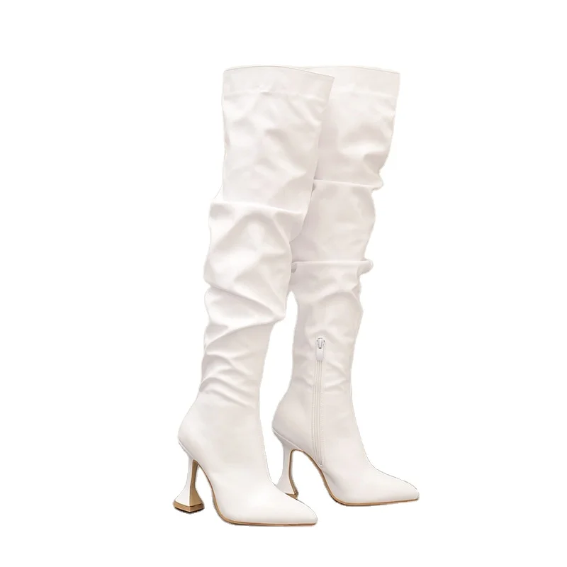 Botas altas para bajitas: Resolvemos el dilema de cómo llevarlas | Vogue