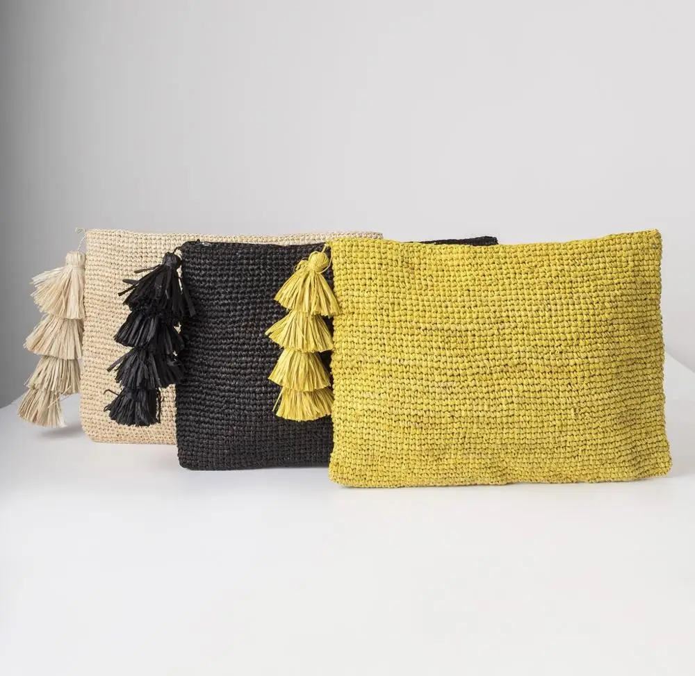 Source Wholesales cheapest hot raffia clutch bag with tassel chain