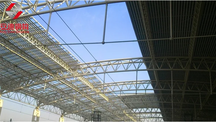 Prefabricated Railway Station Galvanized Steel Structures Curved Roof Design Structural Steel Pipe Truss Shed for Sale