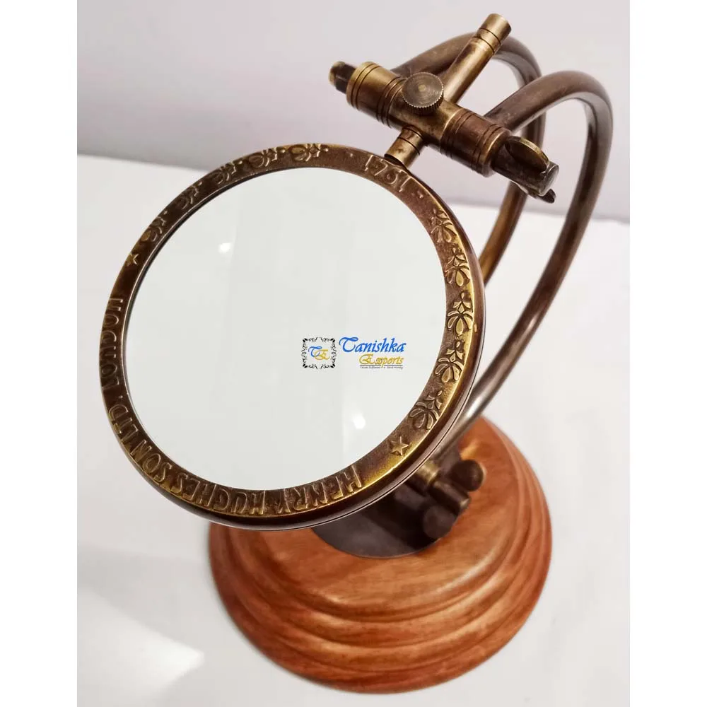 antique magnifying glass on stand