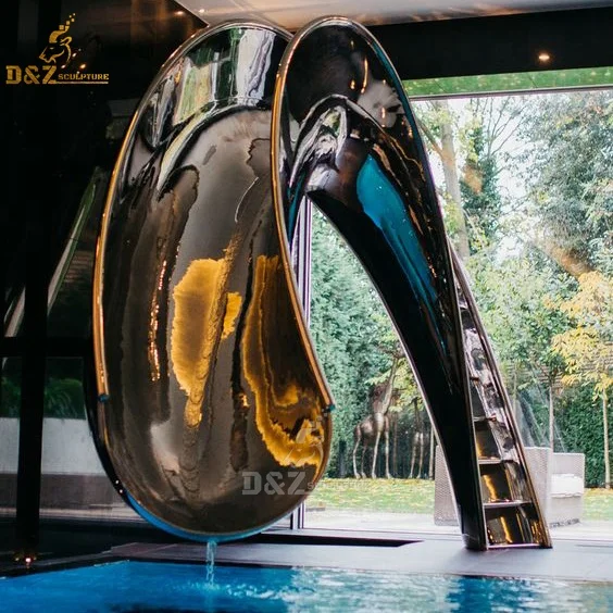 Mirror polished stainless steel sculpture slide for indoor pools