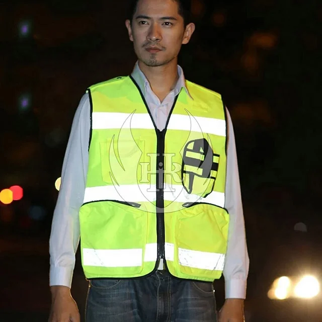Жилет с флуоресцентными отражающими карманами на