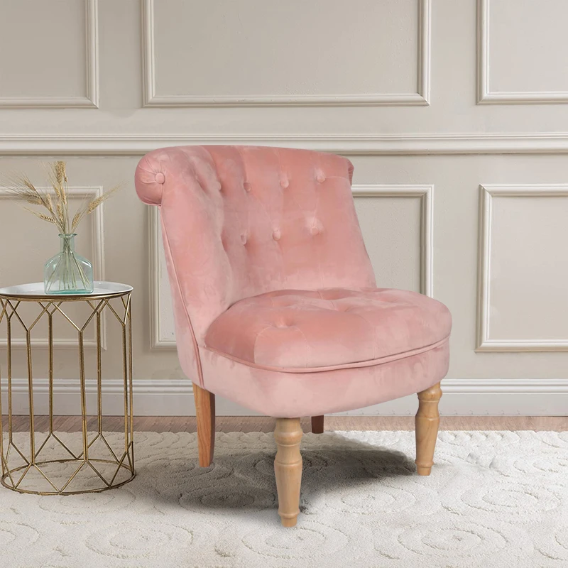 pink velvet chair wooden legs