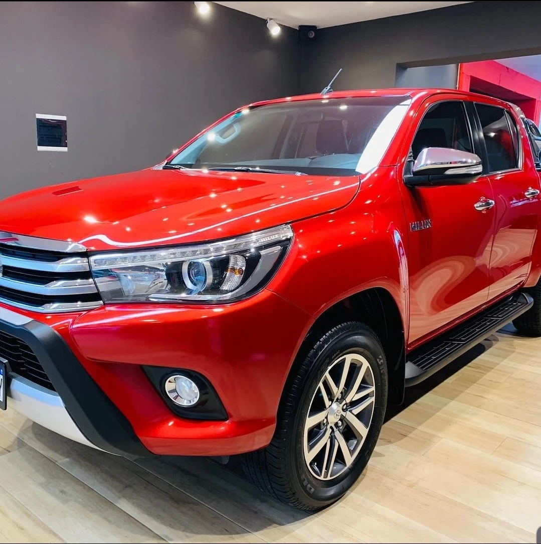 1999 maroon toyota hilux 4x4 pickup